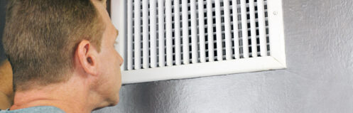 Homeowner looking into vent, AC not blowing air