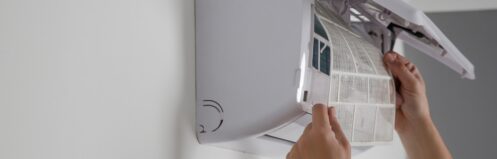 Replacing ductless ac filter during maintenance tuneup